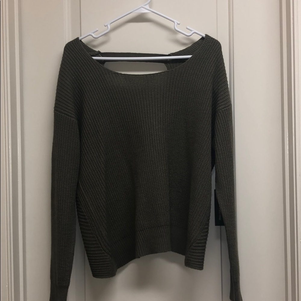 Never been worn, cut out back sweater